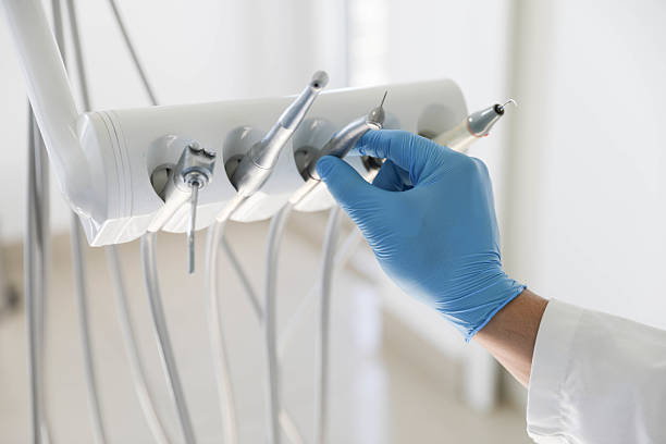 Professional Tooth Extraction technician working in Wright, FL